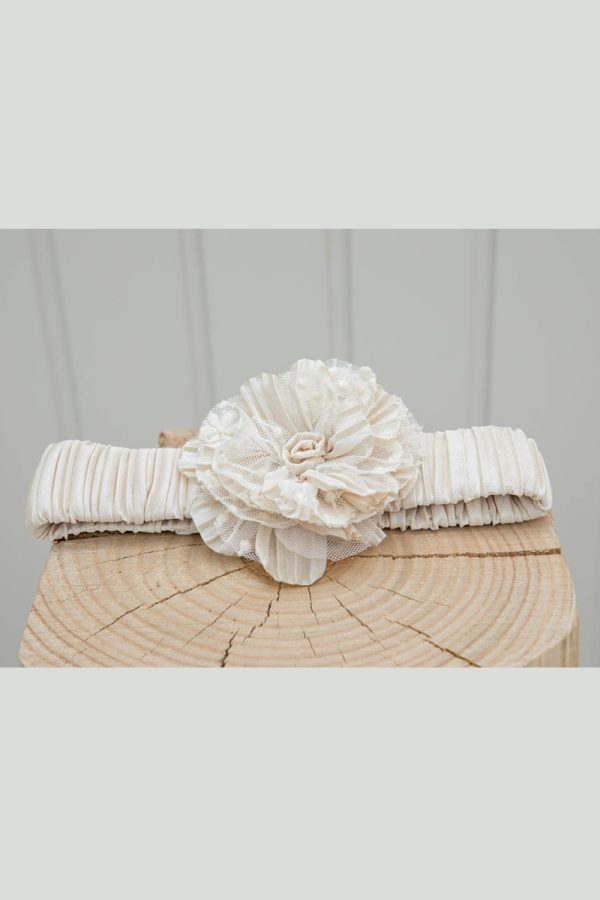 Beige iridescent headband with flower