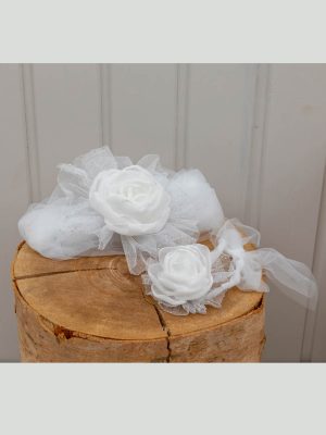 Set of white headwrap and hand boutonniere